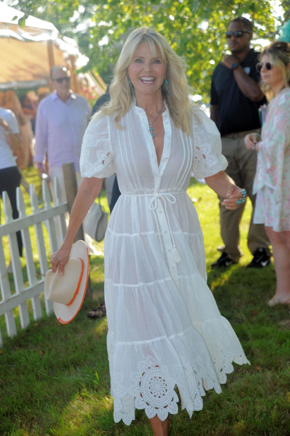 Christie Brinkley smiling at an event