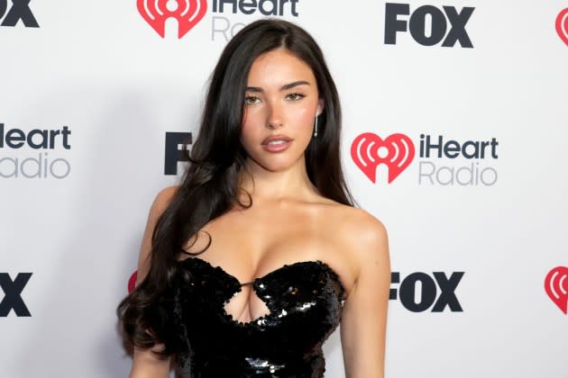 Madison Beer posing in a bold, modern look