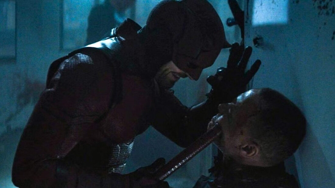 Charlie Cox as Daredevil stands in a darkened New York street, symbolizing the hero's determination in 'Daredevil: Born Again'