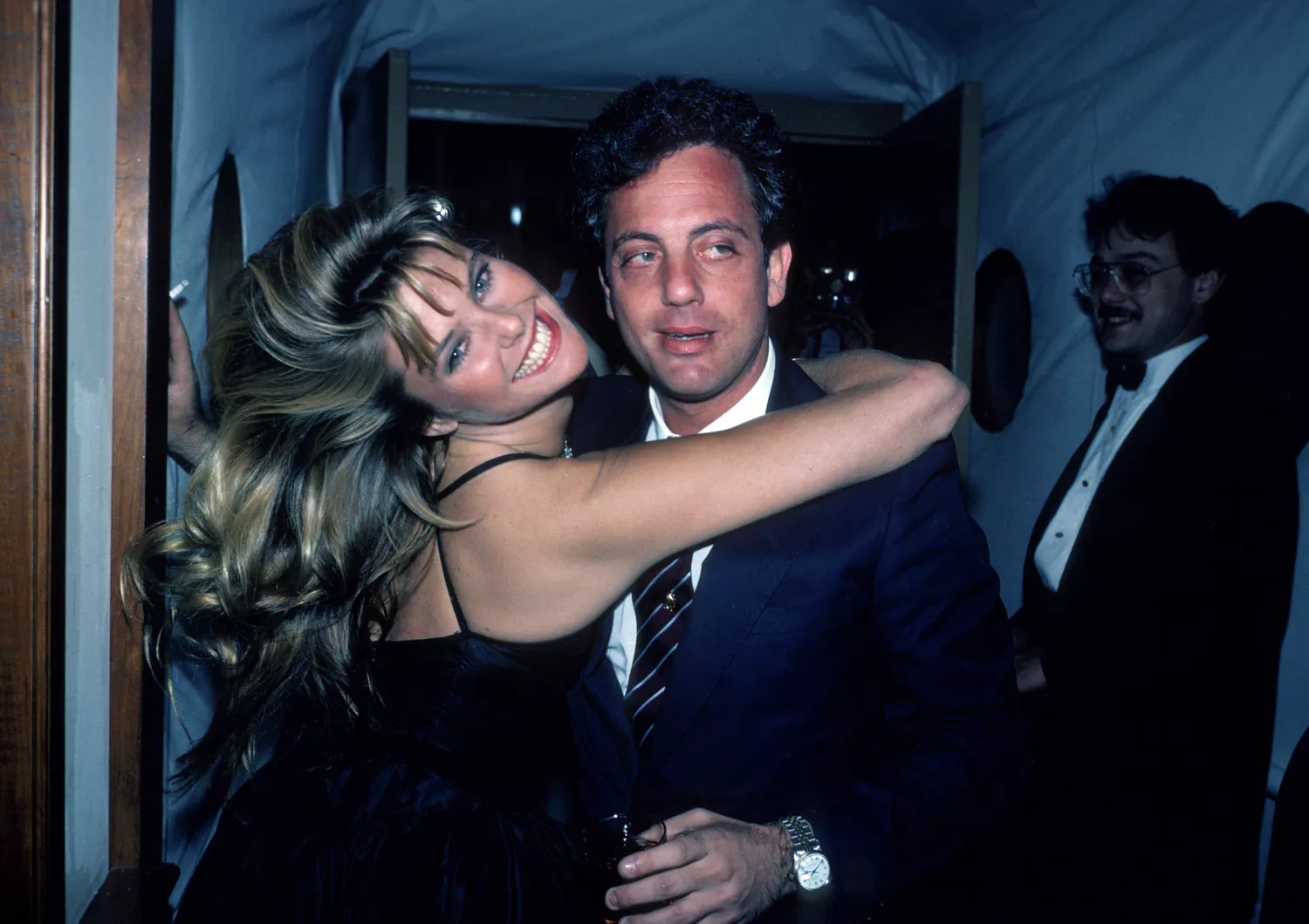 Christie Brinkley at a public event, smiling confidently
