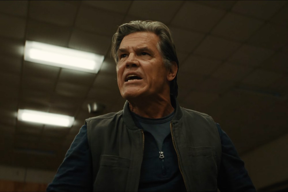 Weapons 2025 horror movie scene featuring Josh Brolin and Julia Garner