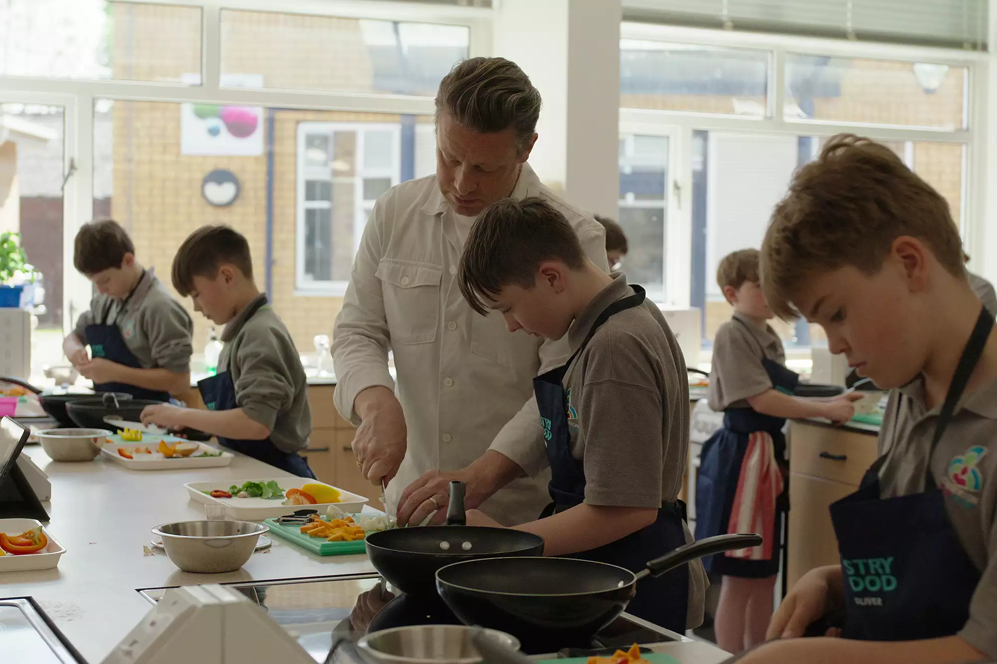 Jamie Oliver cooking with family