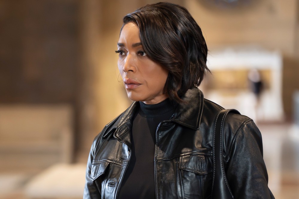 Athena stands by Bobby's casket in the 911 bobby funeral episode