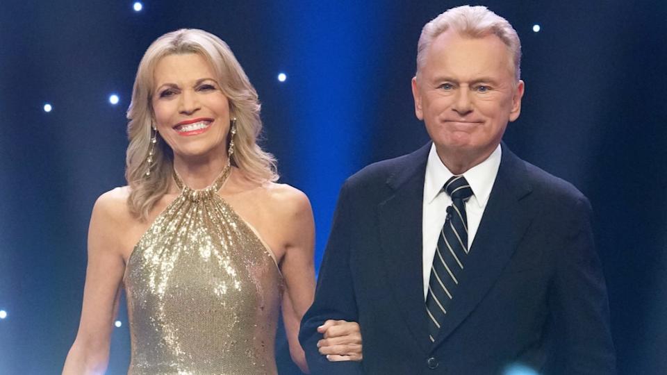 Vanna White on the set of Wheel of Fortune alongside Pat Sajak