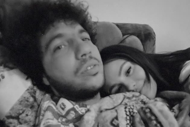 Benny Blanco and Selena Gomez relaxing together on a couch