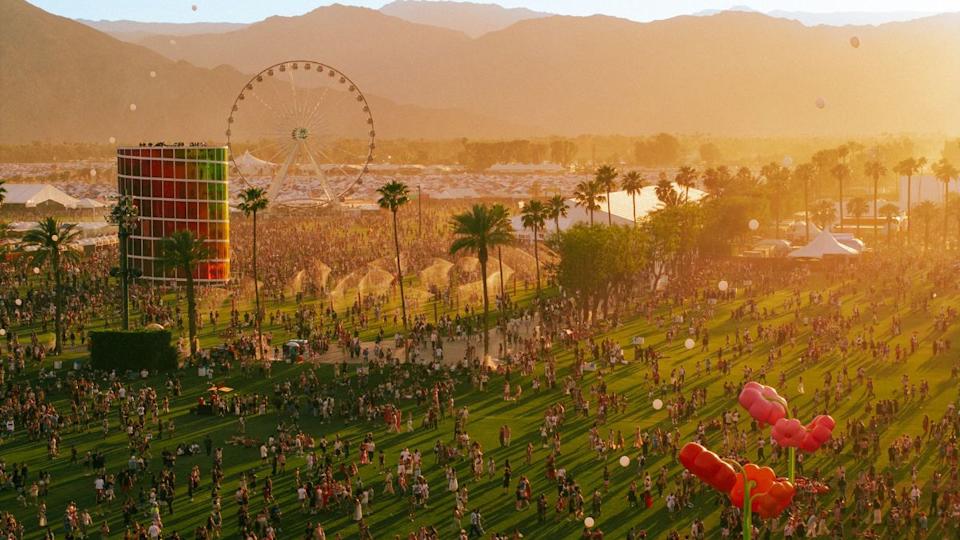 Festival crowd at Coachella 2026 under the desert sunset