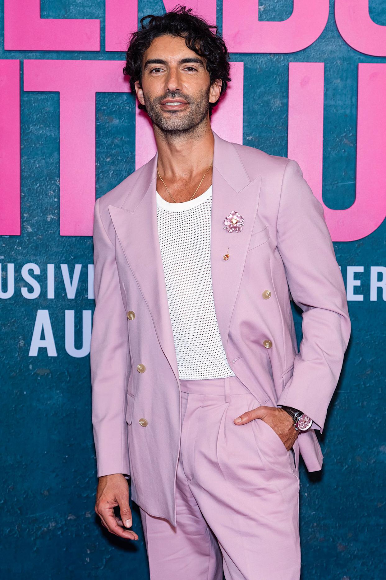 Andrew Rannells at event, smiling with cast members of Another Simple Favor