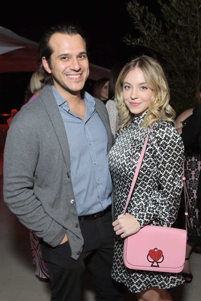 Sydney Sweeney smiling at a public event, embodying her star persona in 2025
