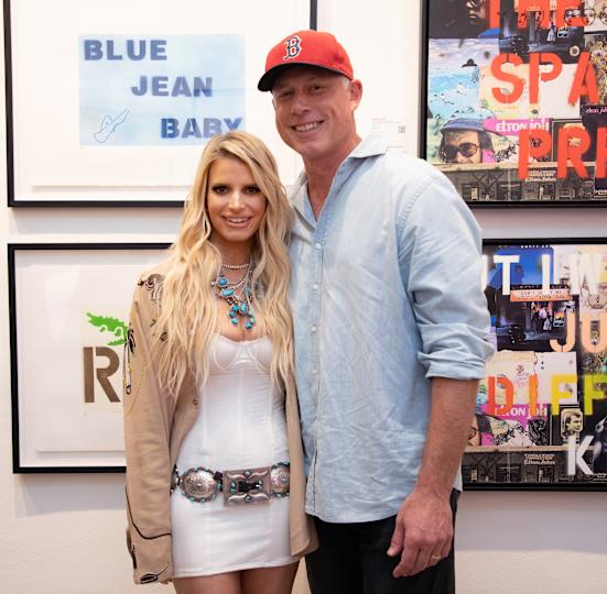Jessica Simpson attending an event, smiling for the cameras