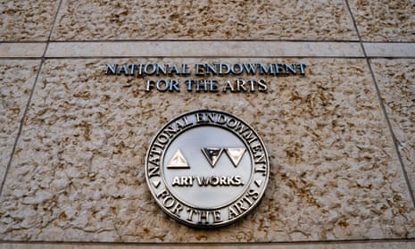 The seal of the National Endowment for the Arts (NEA) in front of federal buildings
