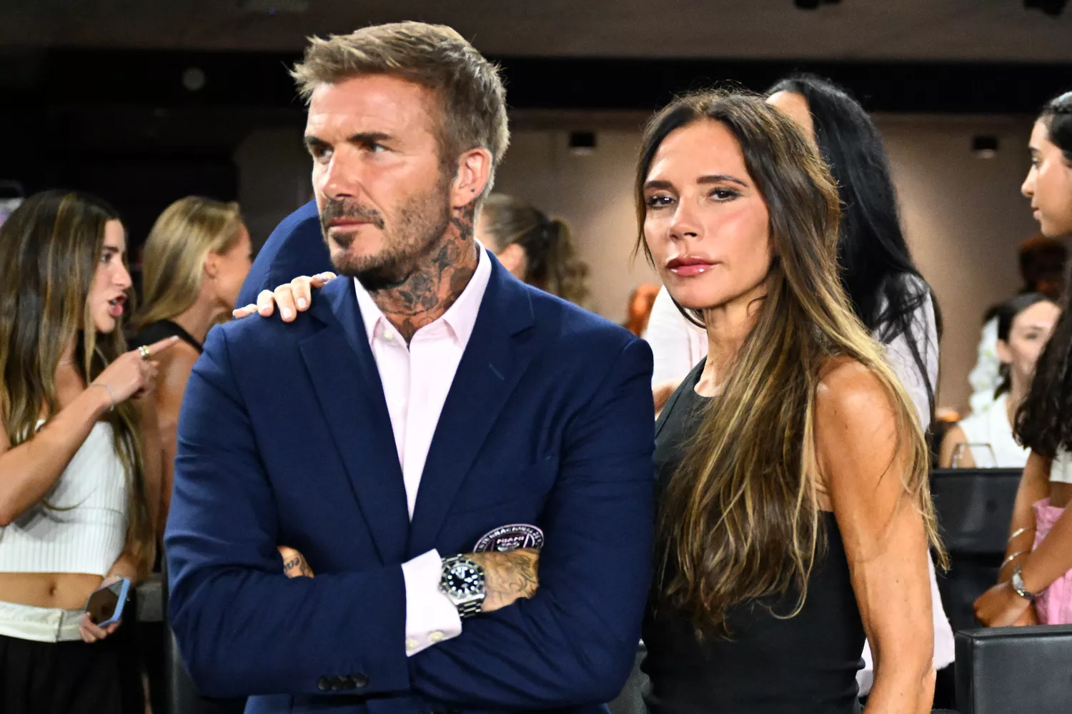 Brooklyn Beckham and family at an event