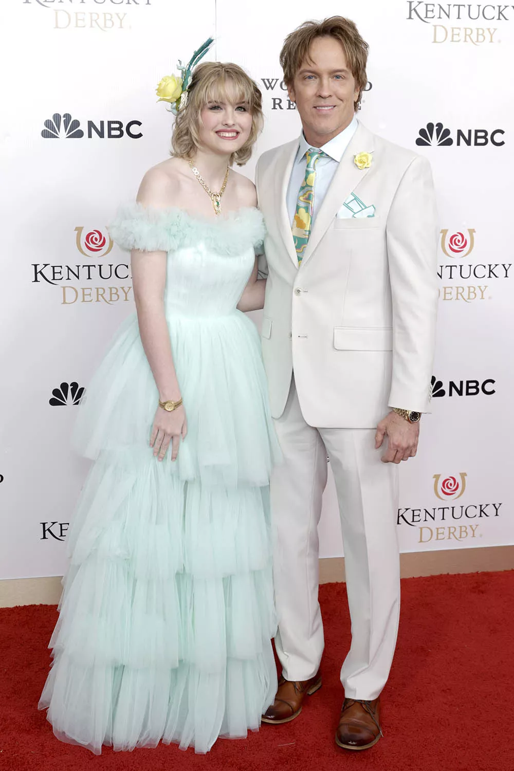 Anna Nicole Smith's daughter, Dannielynn, and Larry Birkhead attend the Kentucky Derby.