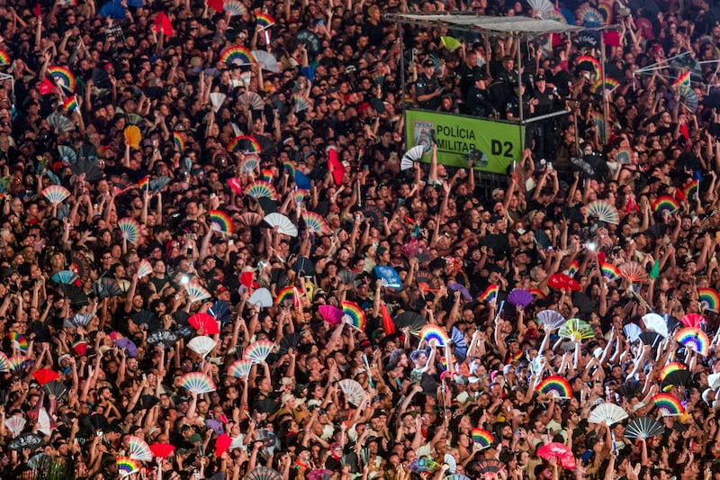 Wide view of Copacabana Beach crowded for a music concert in Rio de Janeiro, Brazil