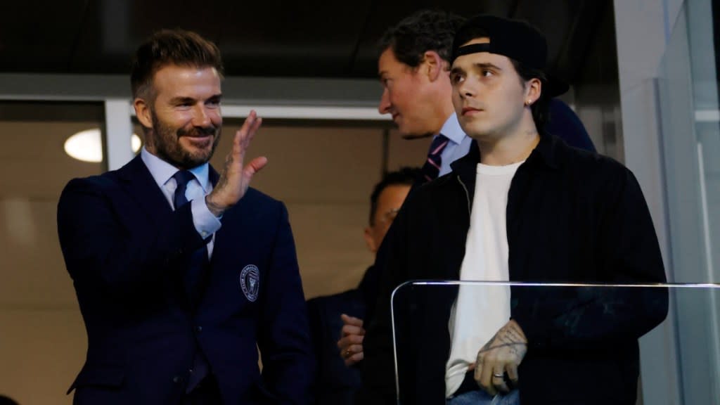David Beckham celebrating his 50th birthday, looking happy among friends