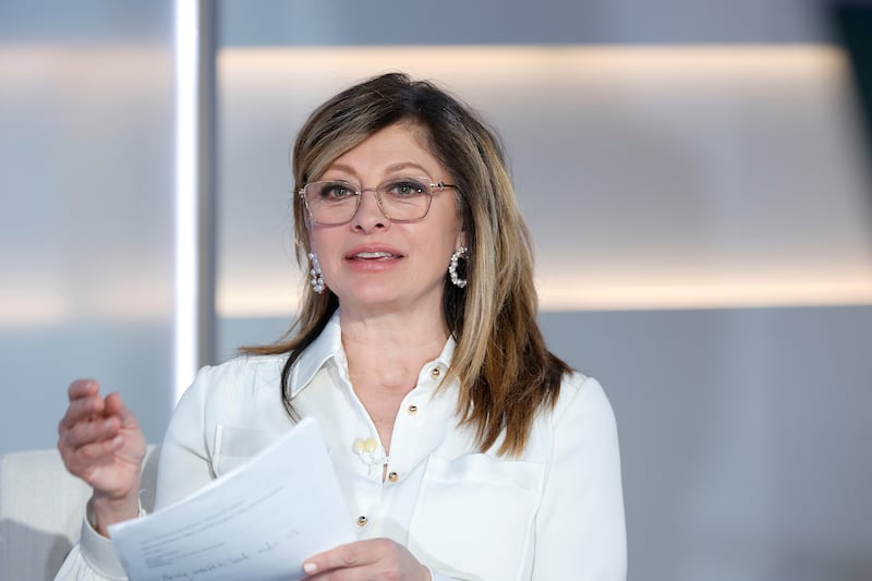 Maria Bartiromo attending a formal White House event