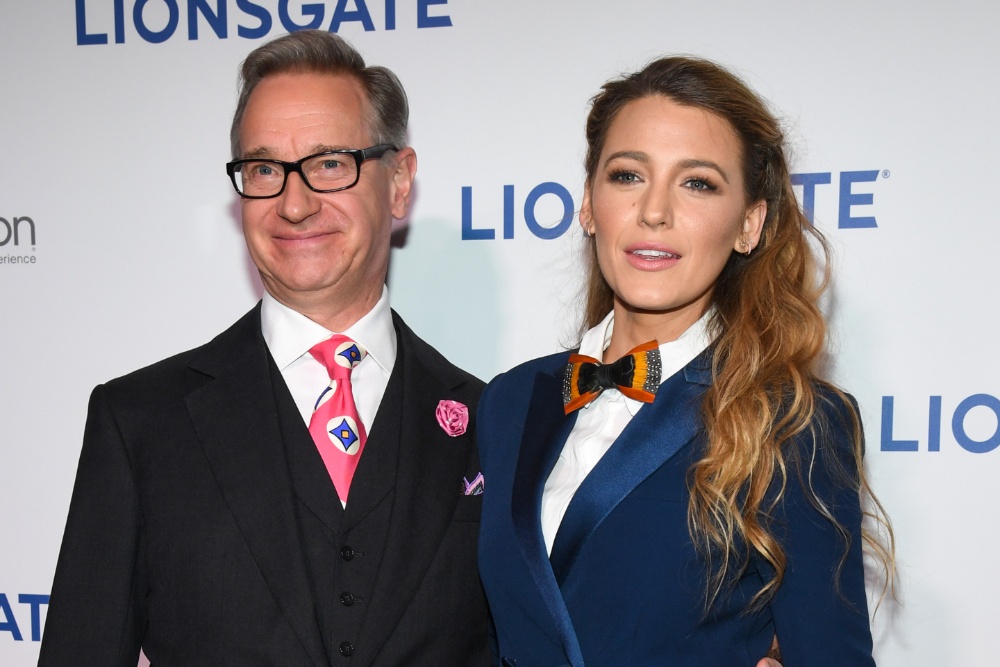 Blake Lively at a movie premiere, showcasing her signature style.