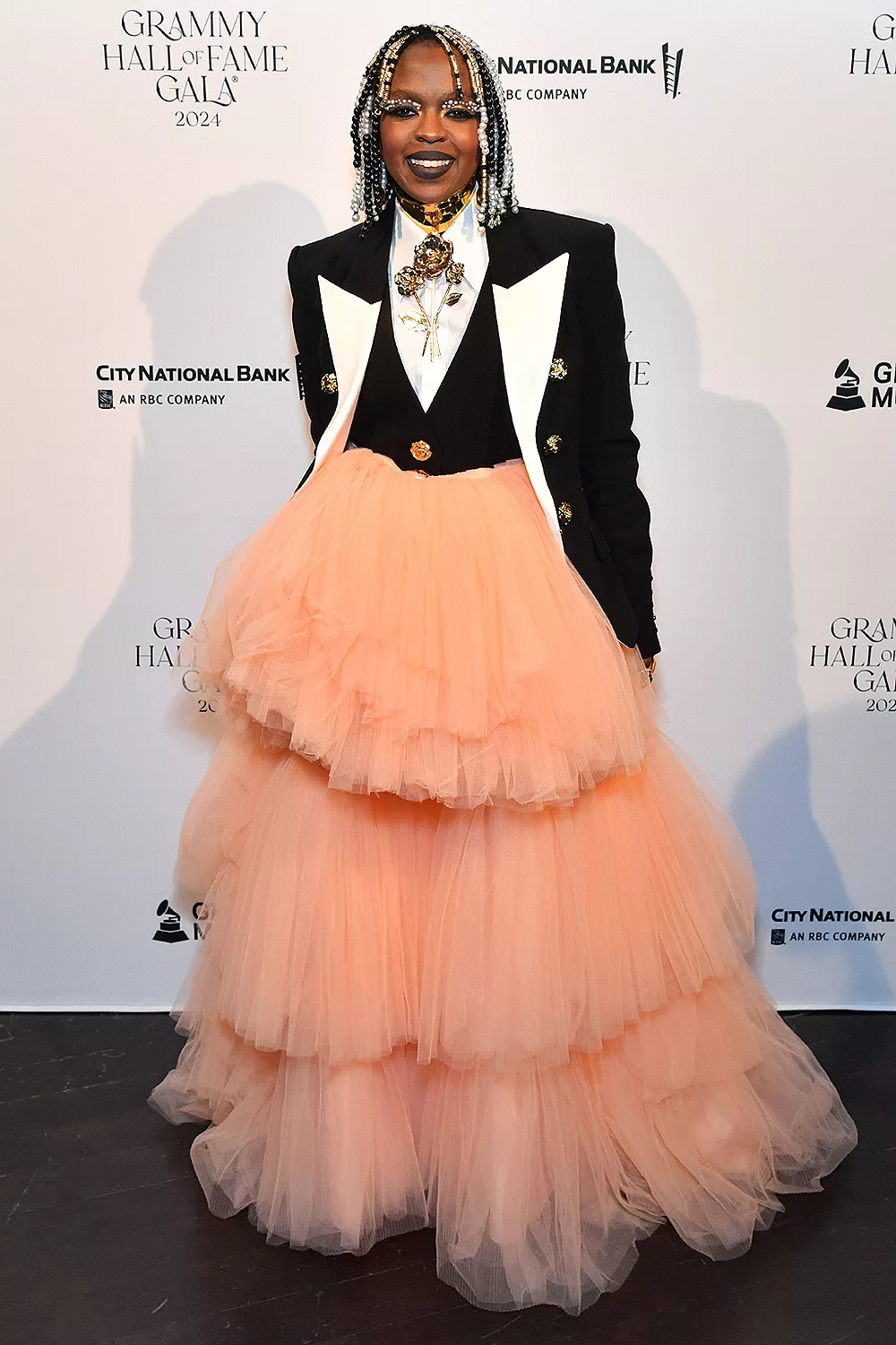 Lauryn Hill at the 2025 Met Gala in butter yellow suit