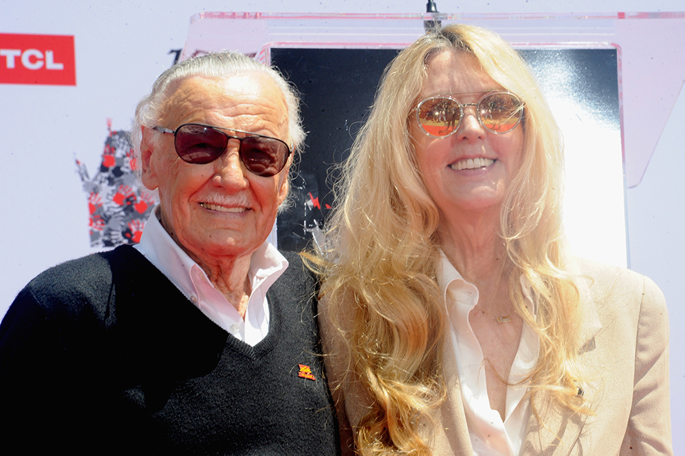 Portrait of Stan Lee smiling at a comic convention event, celebrating the Marvel icon's legacy