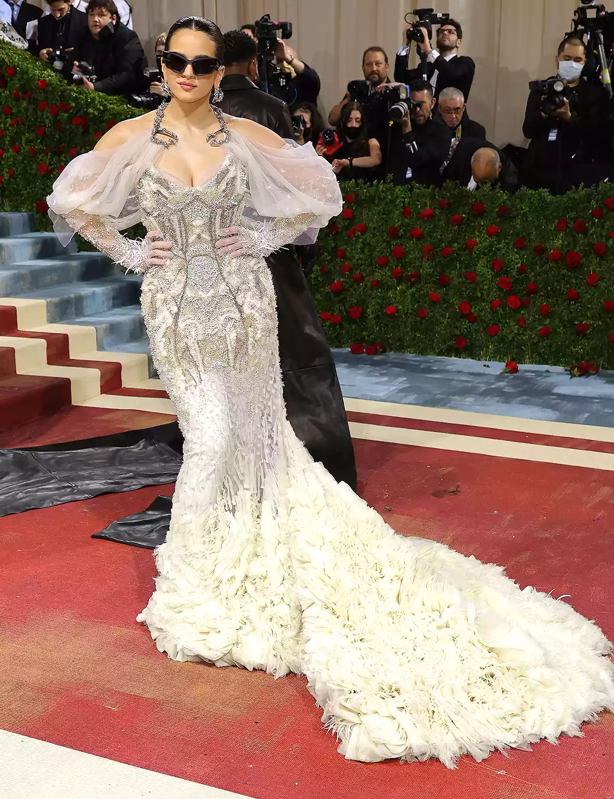 Rosalía at the 2025 Met Gala in a white sculpted gown