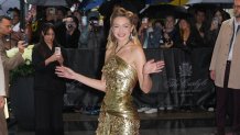 Gigi Hadid at Met Gala 2025 in a shimmering gold gown