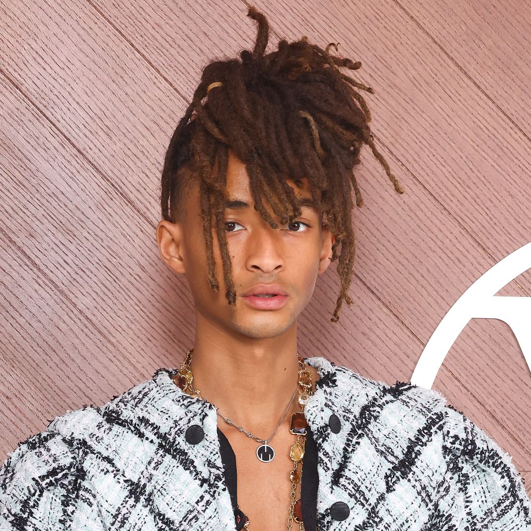 Jaden Smith walking the 2025 Met Gala red carpet, wearing a dramatic wire headpiece and tailored suit