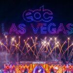 A vibrant view of EDC Las Vegas festival grounds with crowds and lights
