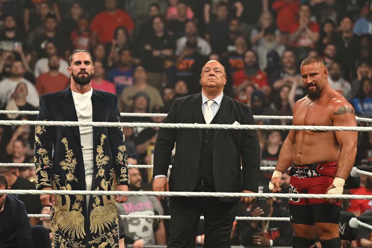 Jey Uso celebrates his WWE Raw victory holding the championship
