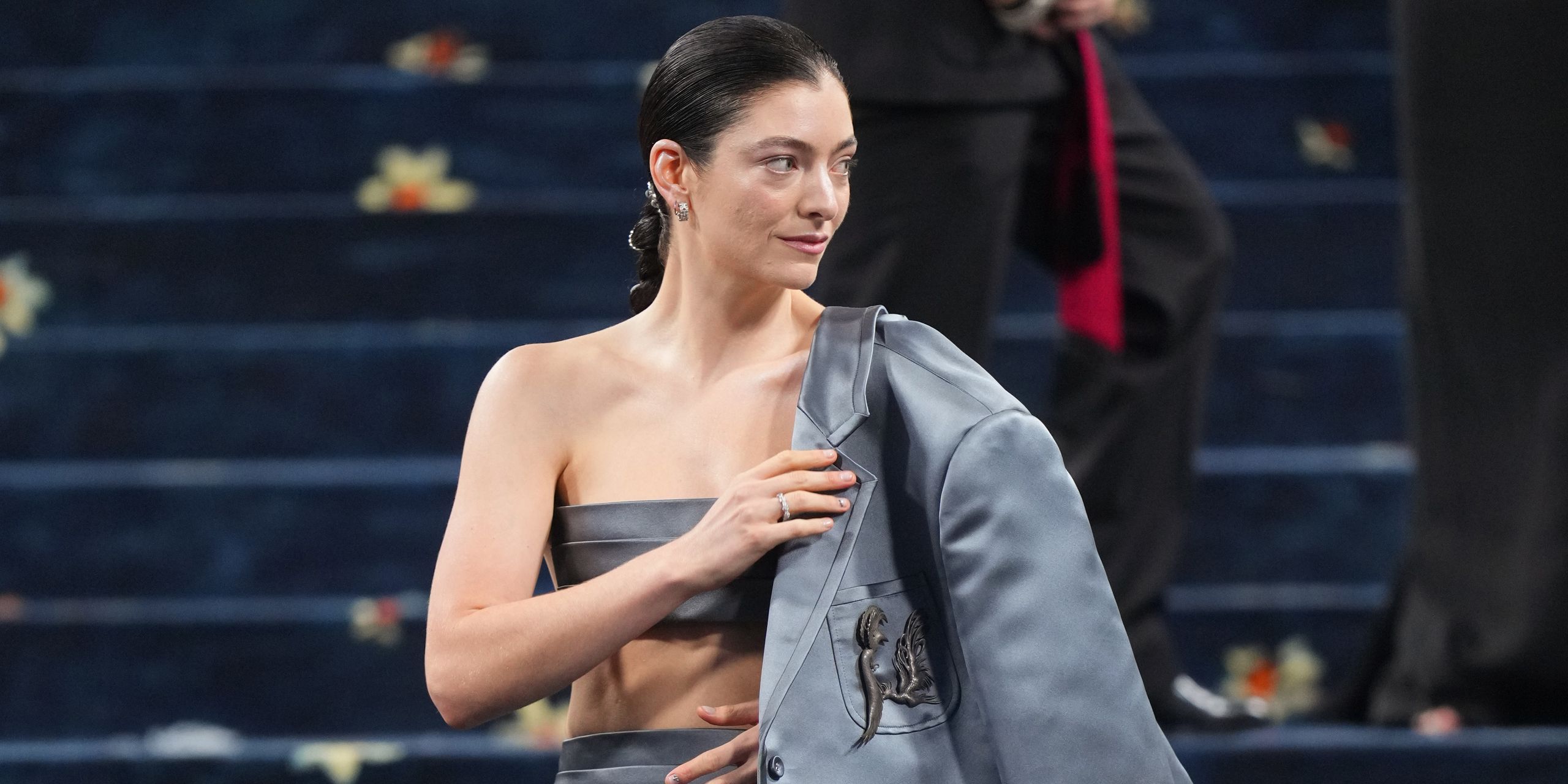 Lorde Tour announcement image showing Lorde on stage