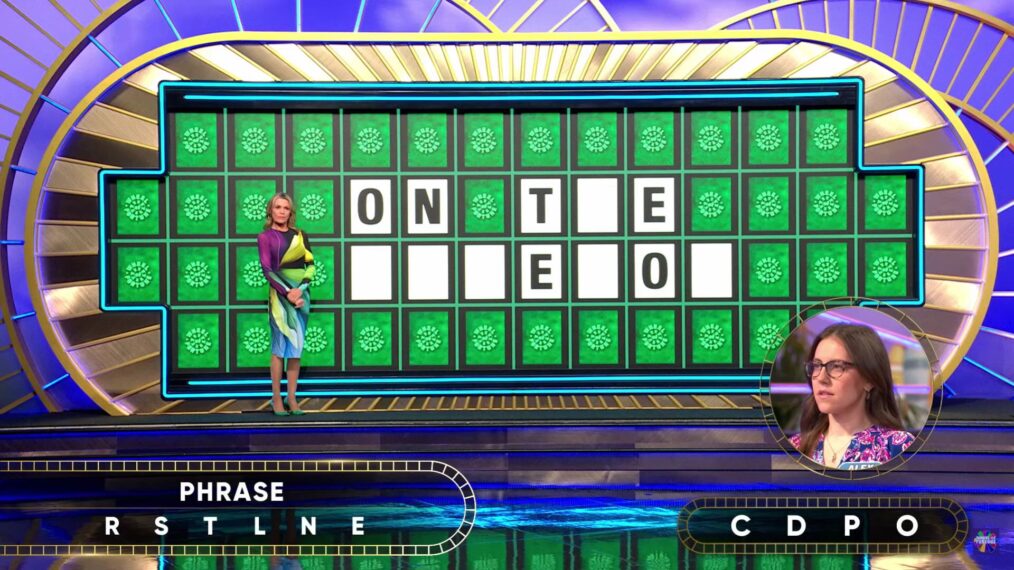 Celebrity Wheel of Fortune hosts and celebrity contestants on stage