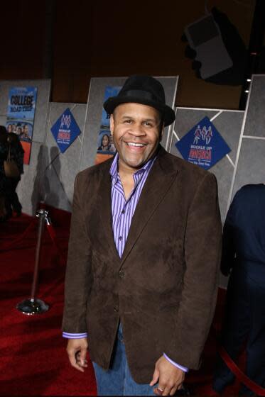 Rondell Sheridan attends an event smiling, highlighting his resilient spirit.
