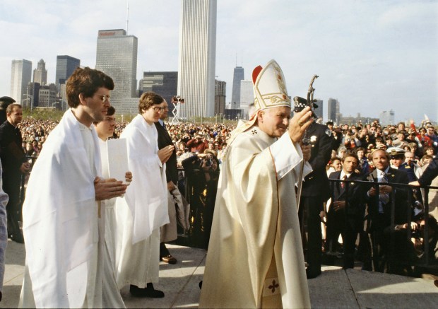 Pope John Paul II greeted by crowds in Chicago, 1979.