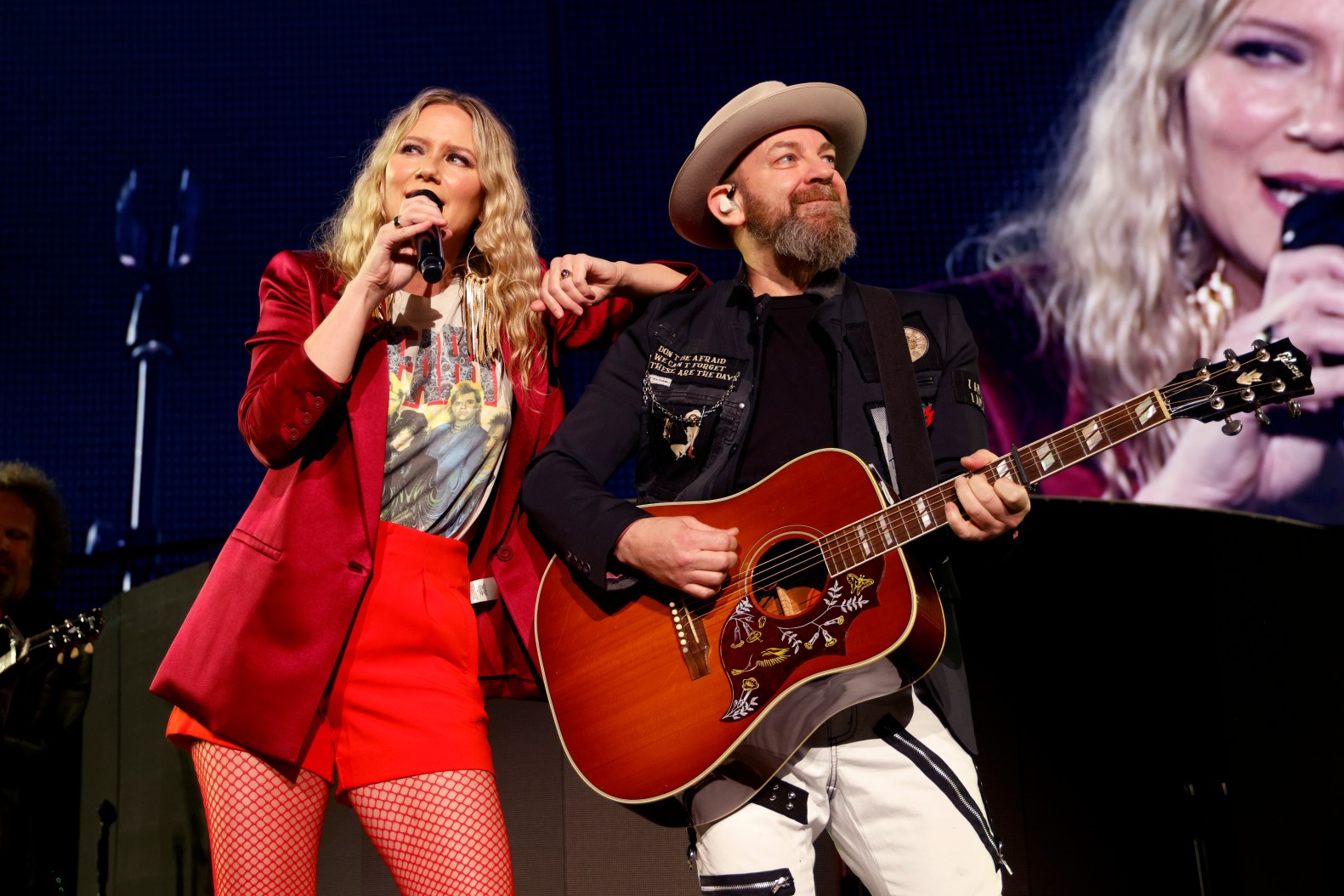 Jennifer Nettles performing on stage during a live country music event