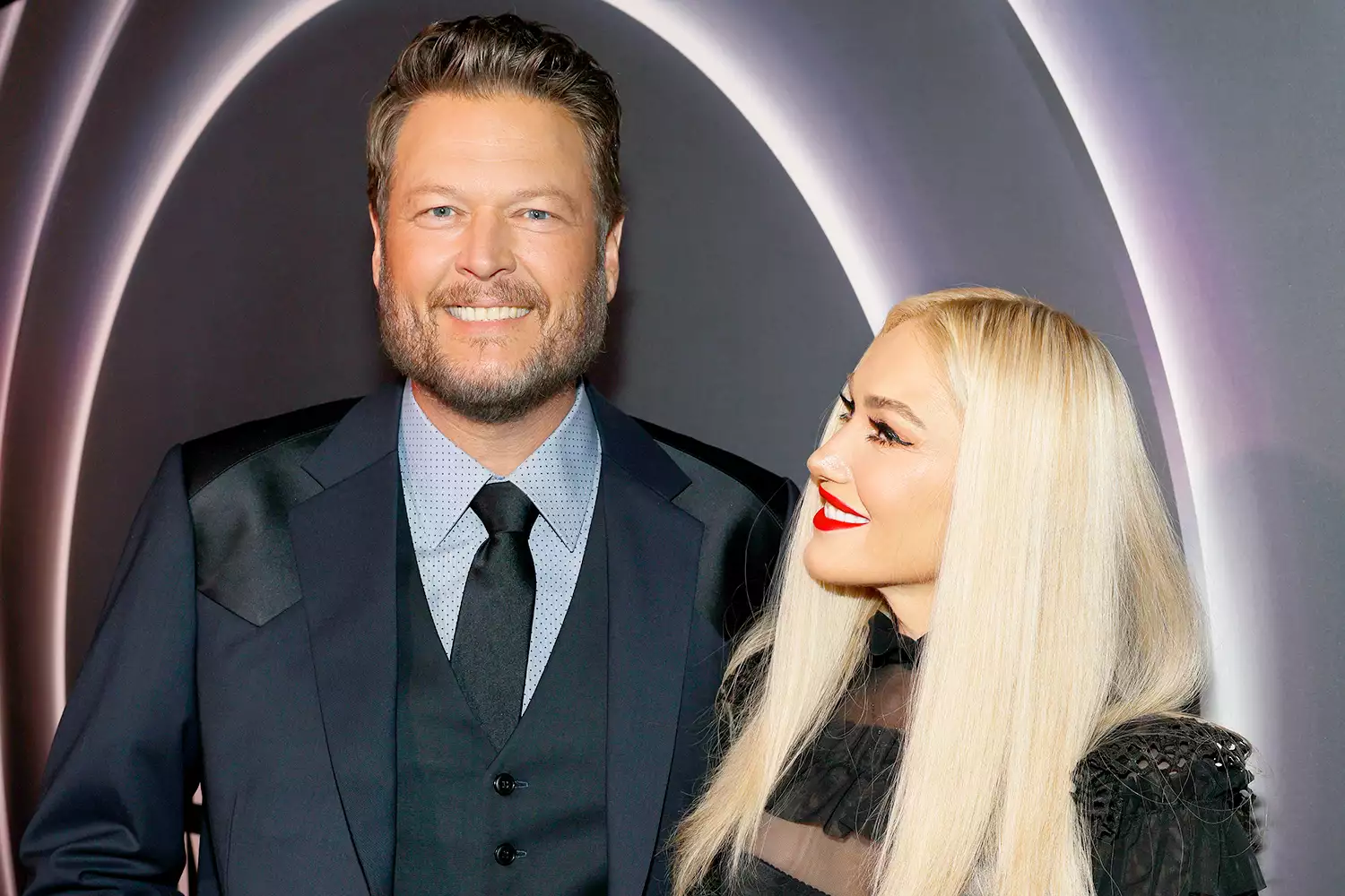 Blake Shelton smiling on stage during a live performance in 2025