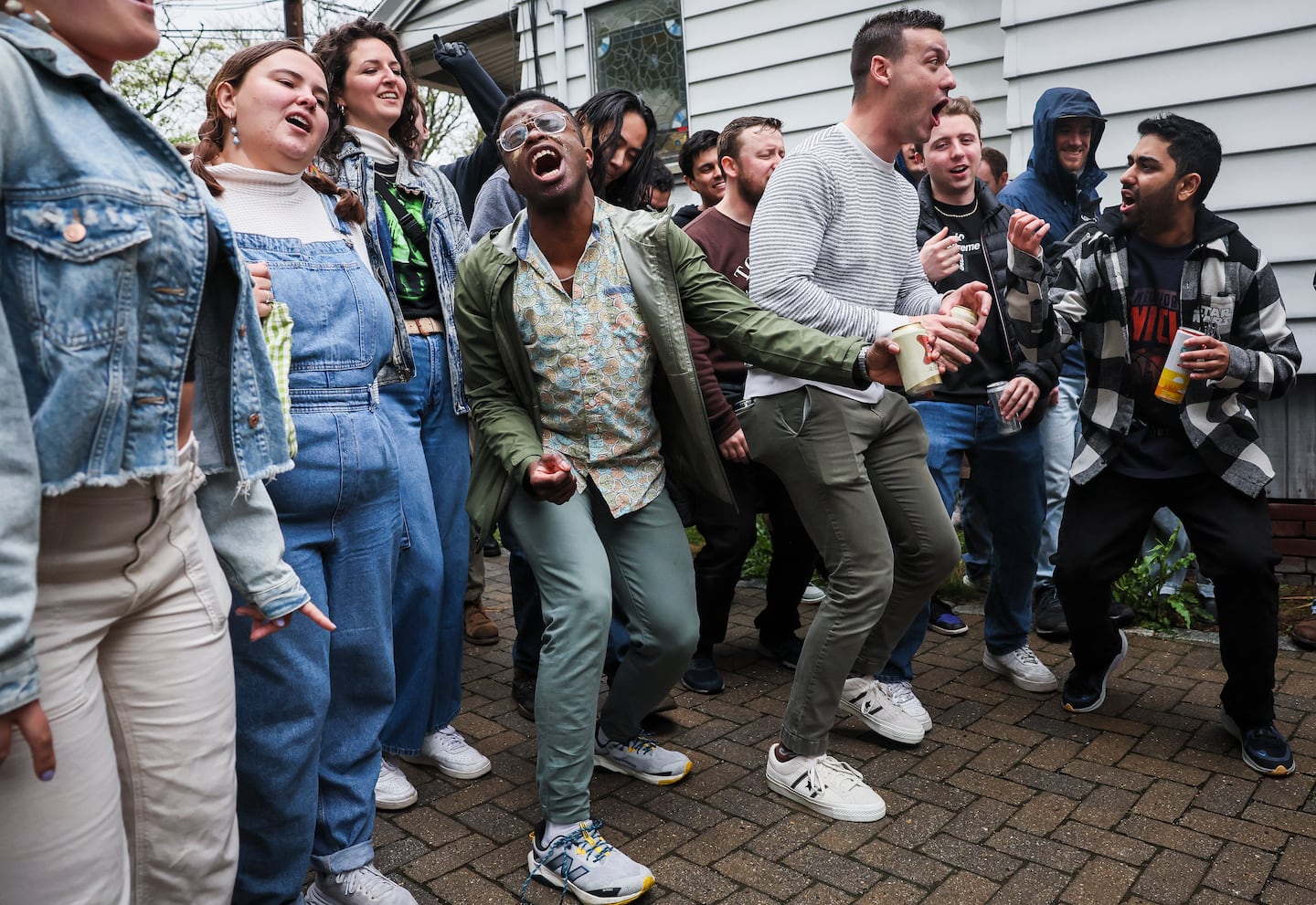 A local band performs on a front porch at Porchfest Somerville, bringing the community together through music