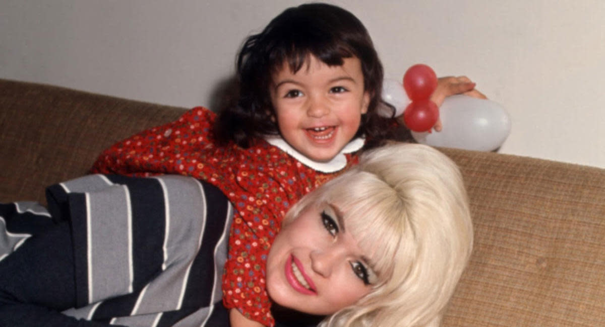 A mother and daughter embracing, sharing a heartfelt moment on Mother’s Day