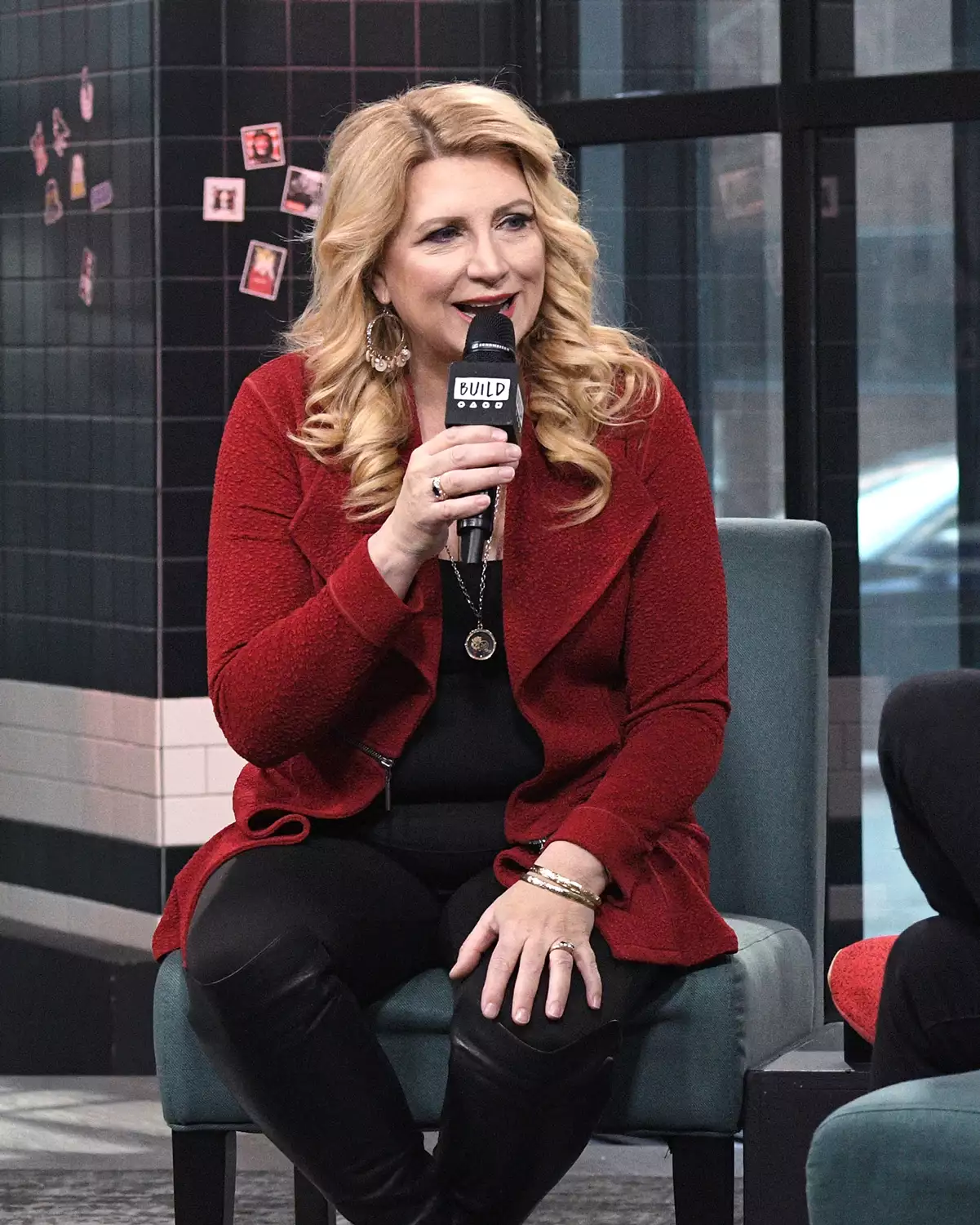 Delilah radio host smiling as she connects with listeners every night