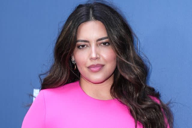 Denise Bidot attending a public event, smiling confidently