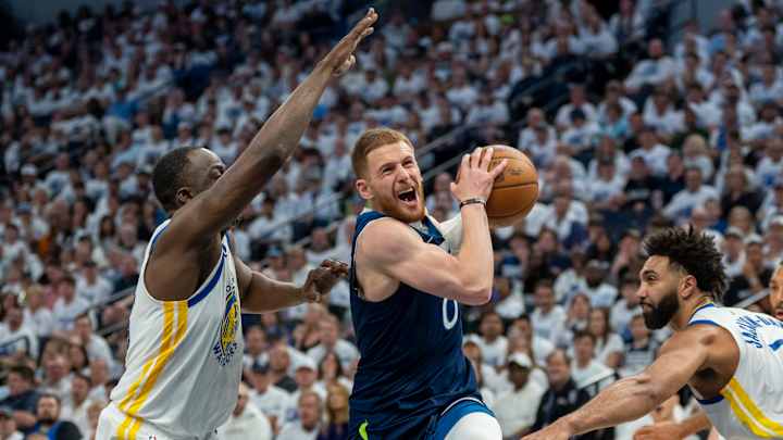 Donte DiVincenzo driving to the basket during an NBA playoff game