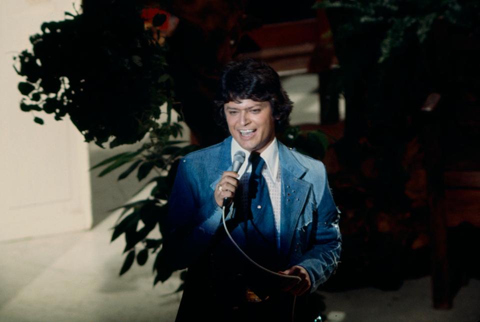 George Strait performing live on stage