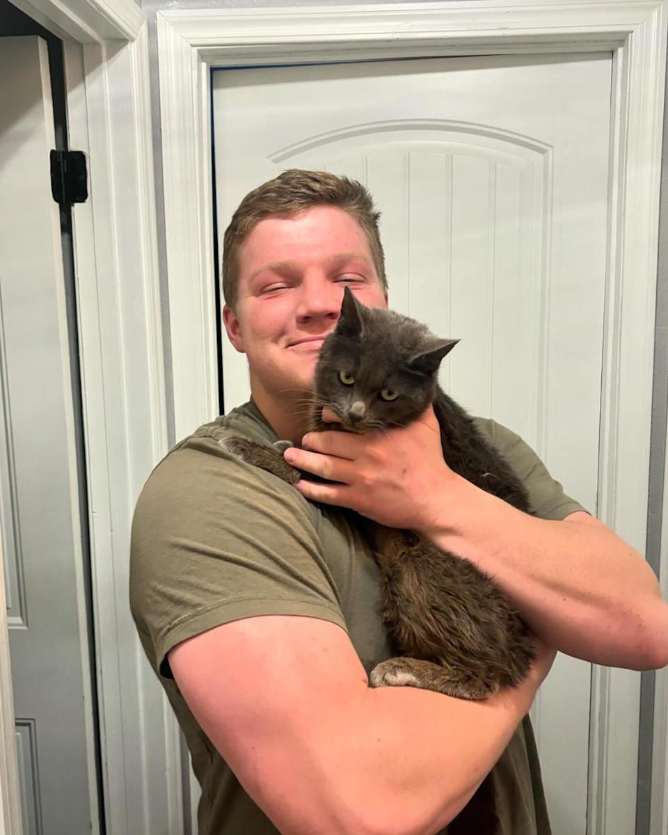 Garrison Brown with family and animals