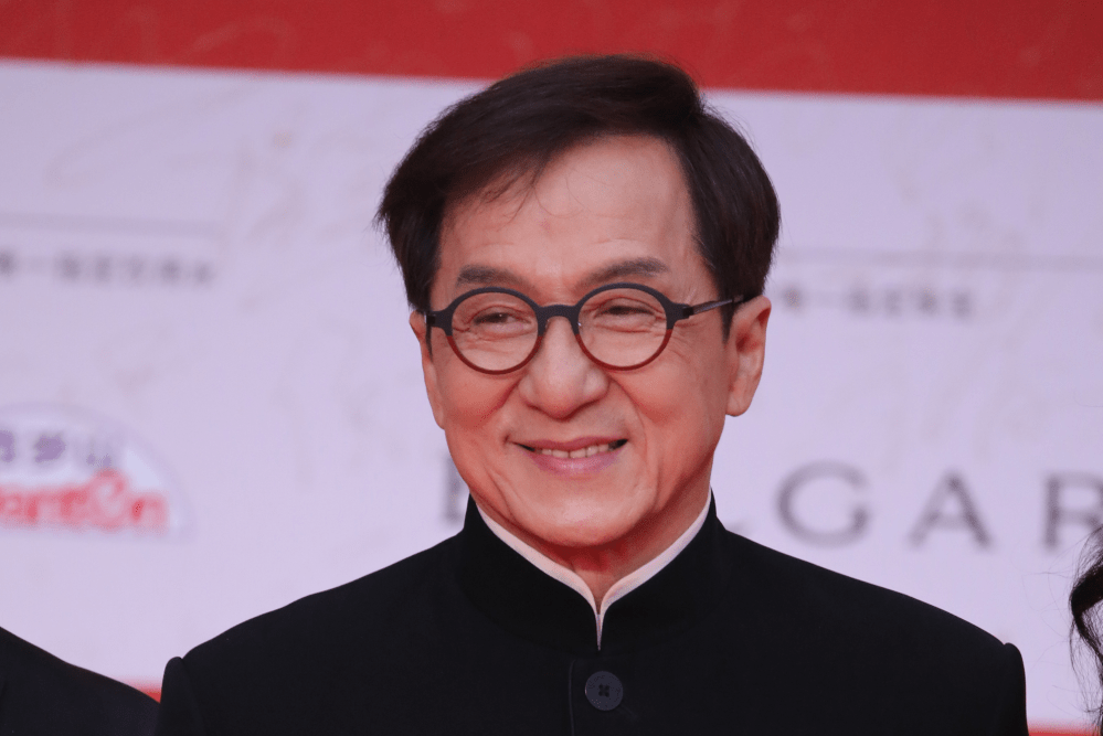 Jackie Chan performing one of his iconic stunts
