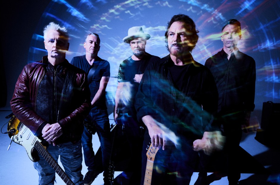 Pearl Jam members performing live, representing their influence on pop culture and recent HBO collaborations.