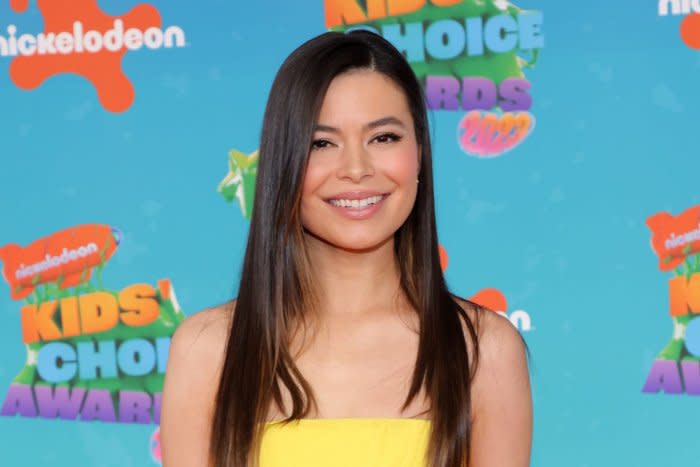 Miranda Cosgrove attends a premiere event