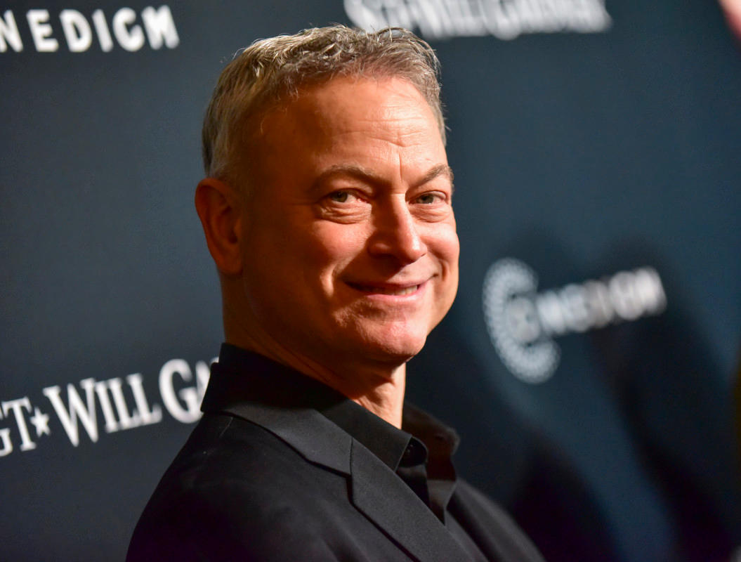 Gary Sinise pictured smiling outdoors, reflecting on family life and legacy