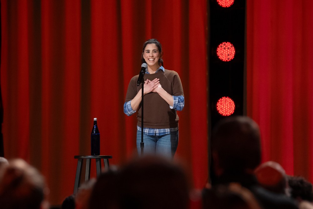 Sarah Silverman performing stand-up on stage during her 'Post Mortem' Netflix special