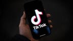 TikTok outage illustration on mobile phone – is TikTok down