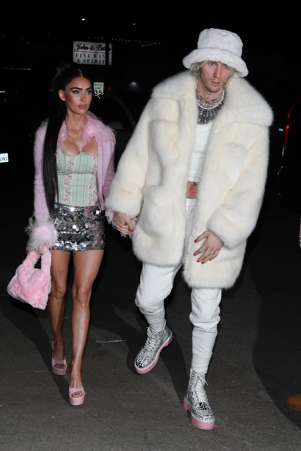 MGK and Megan Fox stepping out together, highlighting their evolving relationship.