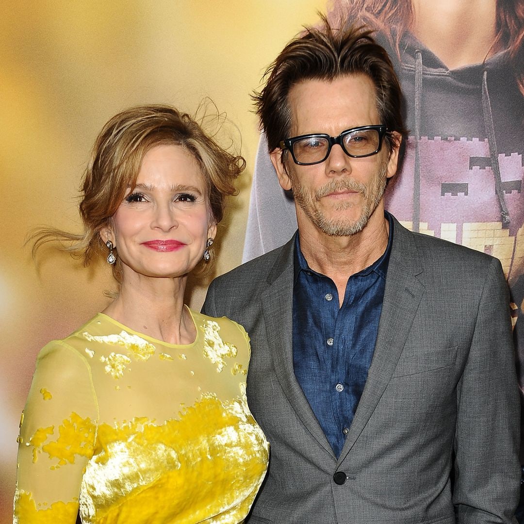 Kevin Bacon at home smiling with his family