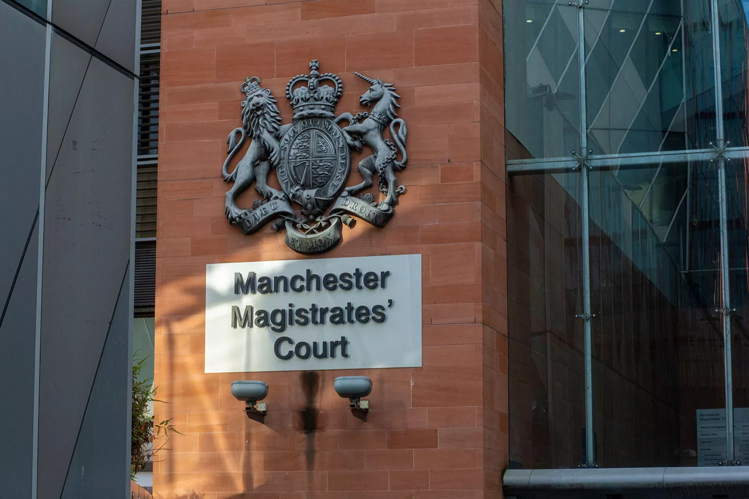 Chris Brown at Manchester Magistrates’ Court, under police custody in 2025