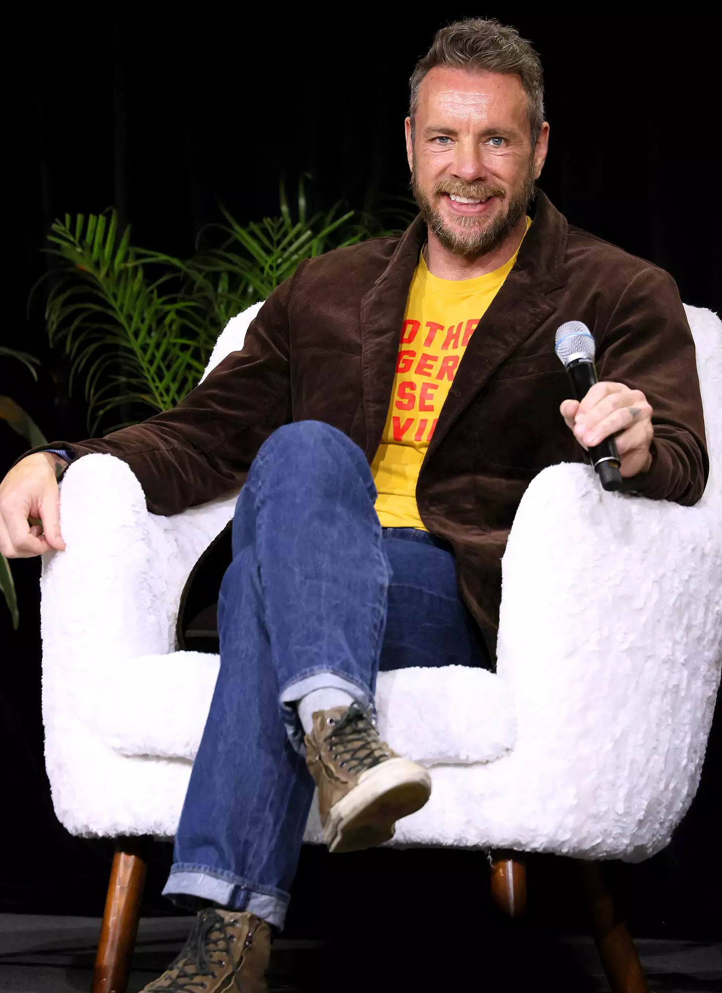 Dax Shepard smiling at an event